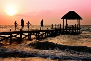 A family having a fun time at a jetty in Andaman