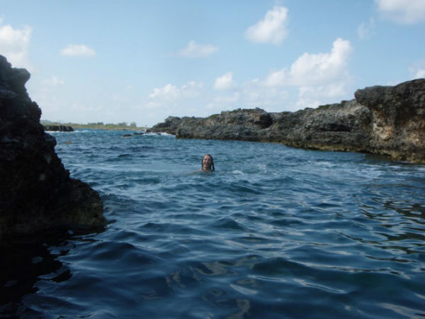 A woman enjoying swimming in the Andaman sea