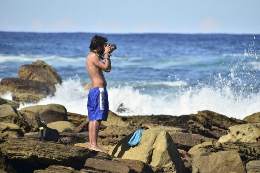 A man taking pictures of the ANdaman Sea
