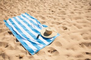 A beach towel can also double up as your mattress